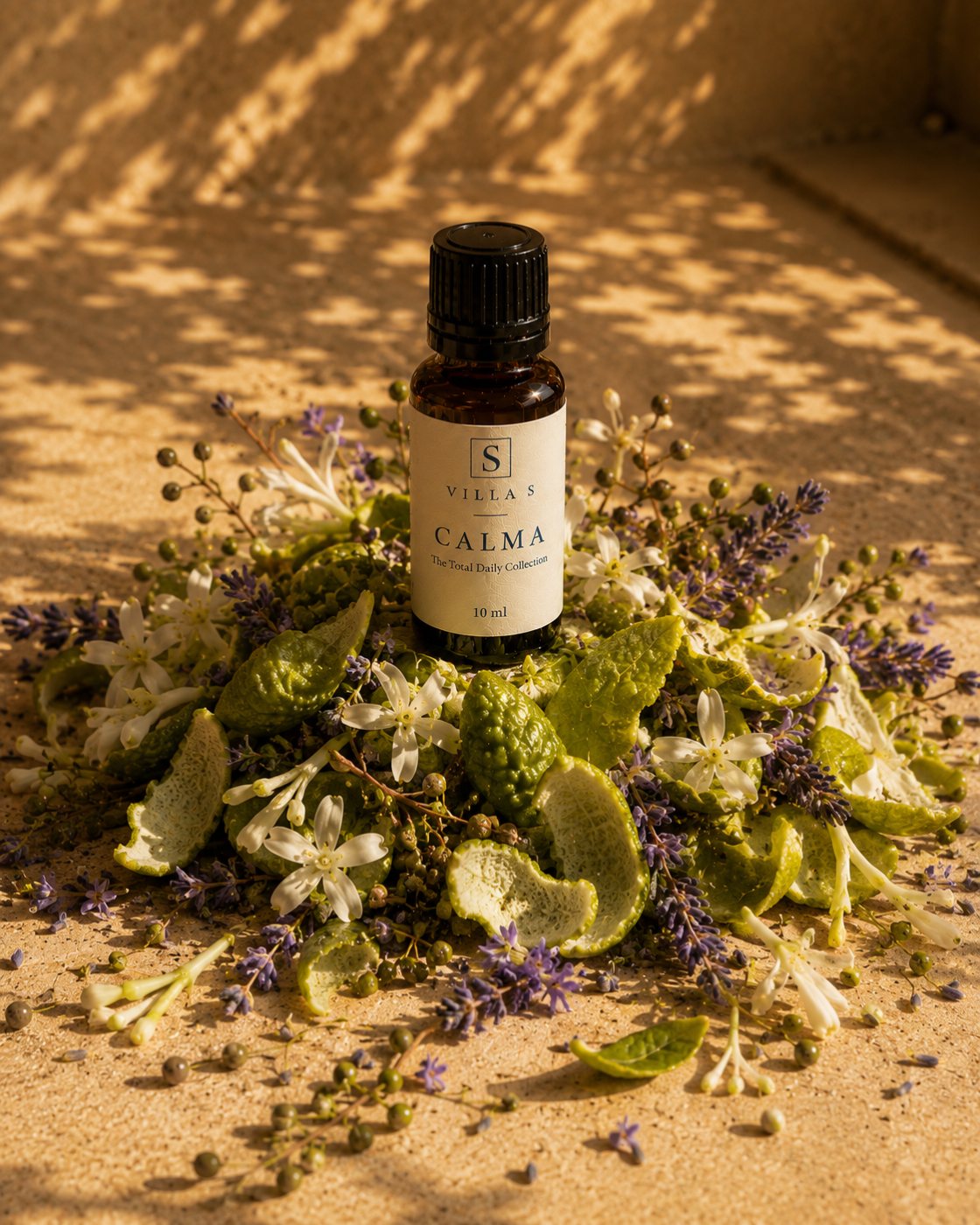Calma blend — lavender, orange and bergamot at golden hour over the sea